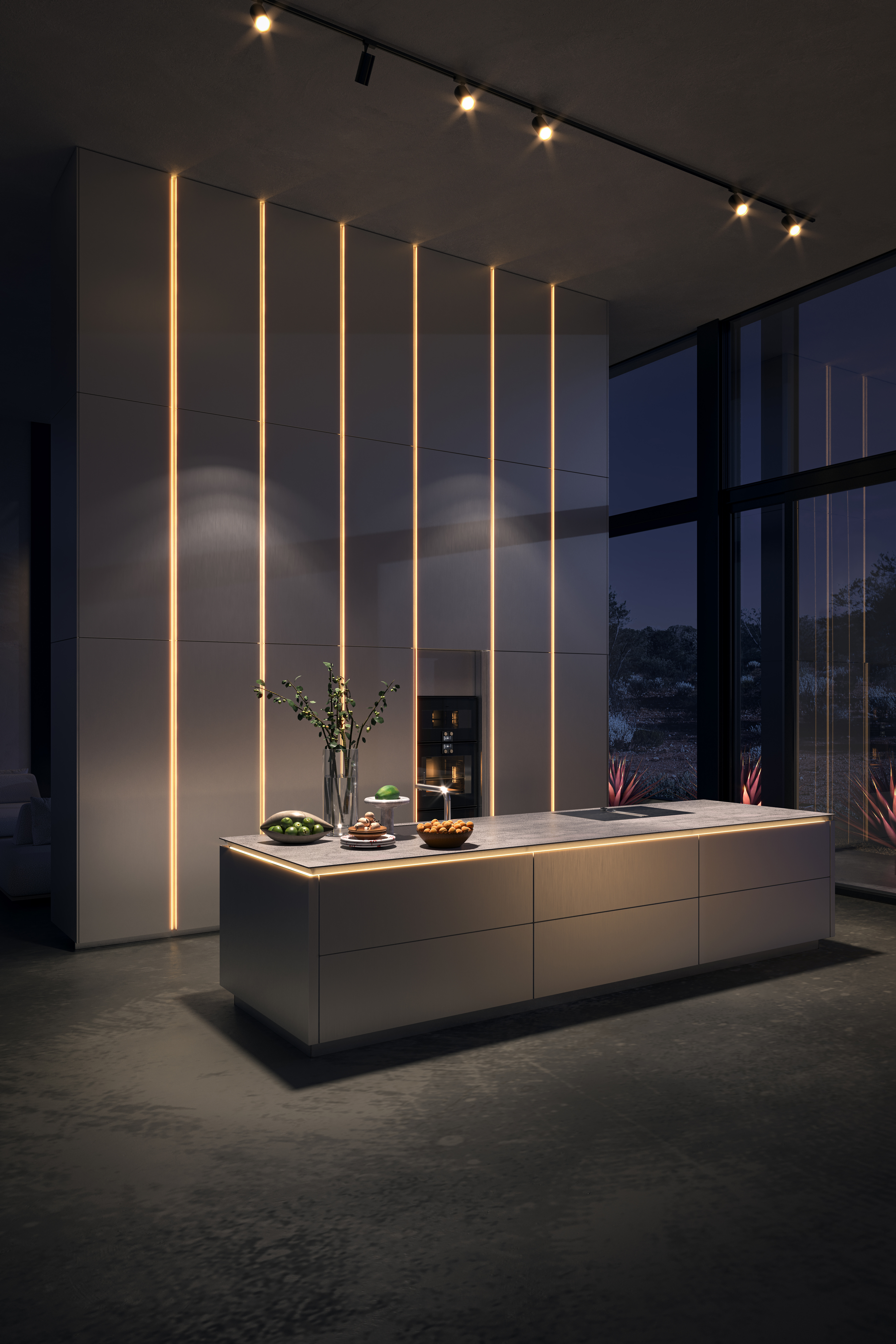 Beleuchtete Kücheninsel mit integrierten Geräten in dunkler Umgebung, moderne SieMatic Küche