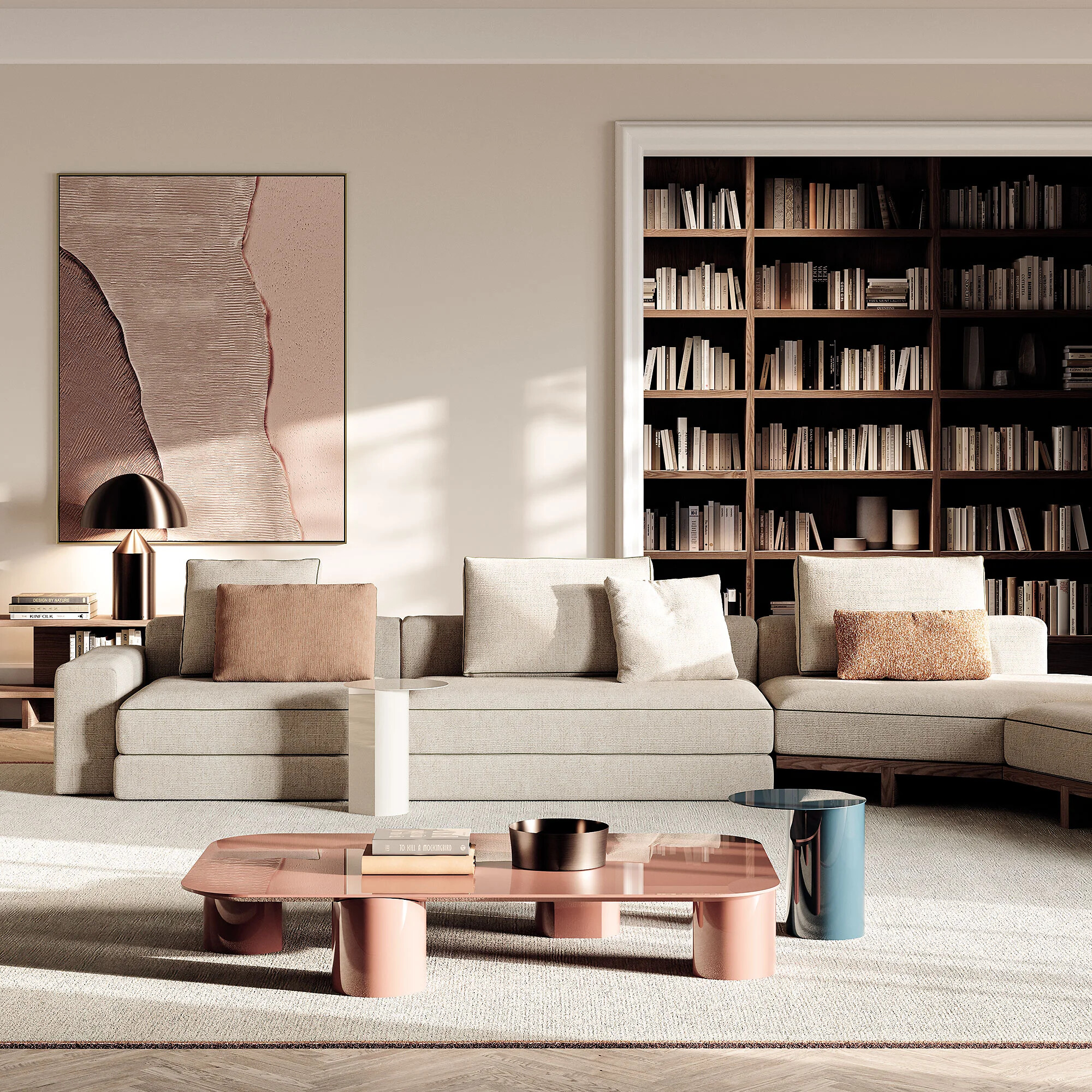 Großzügiges Sofasystem vor Bücherwand mit Couchtisch in Rosé und skulpturalen Details