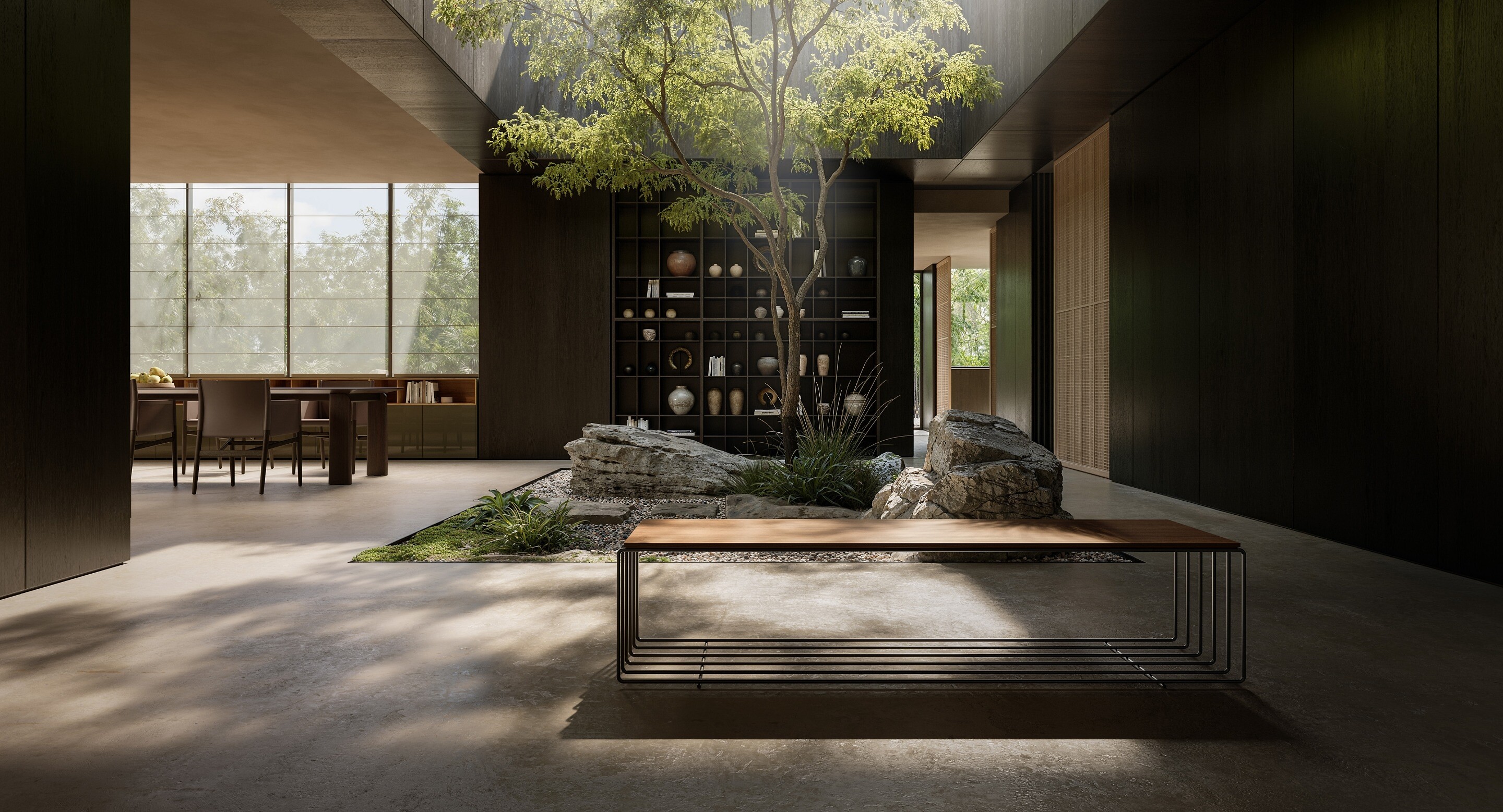 Offener Innenraum mit Tageslicht, Naturstein, Bonsai und Bank mit filigranem Metallgestell  